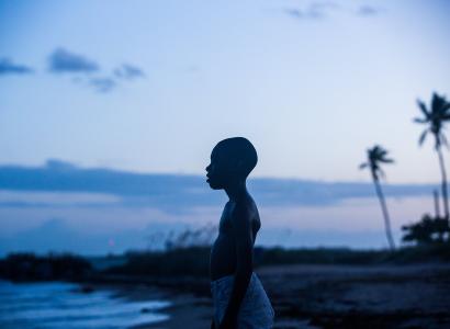 Boy standing on beach