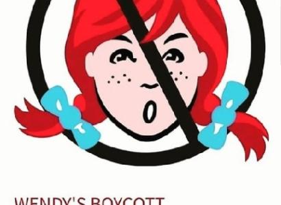 Drawing of girl's head with red pigtails with blue bows and freckles with a circle and line through it in black on top of her indicating No, and the words Wendy's Boycott