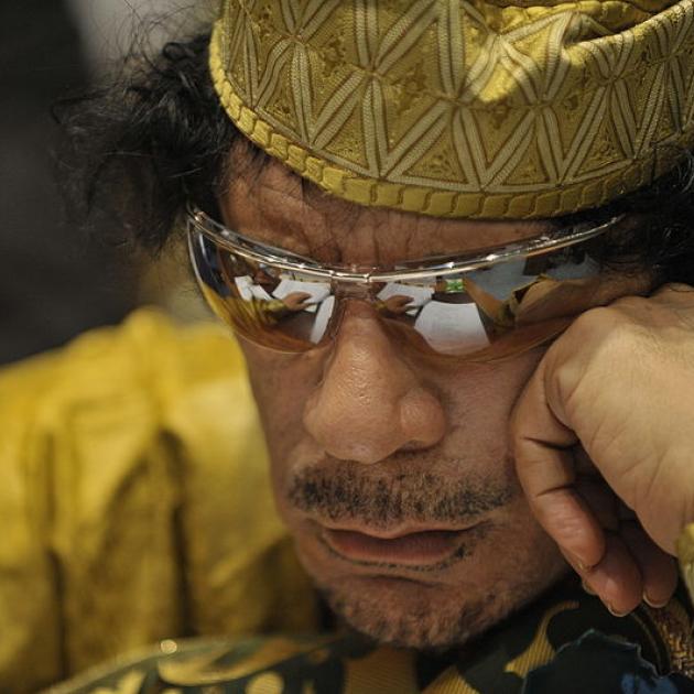 Close up of Qaddafi in sunglasses