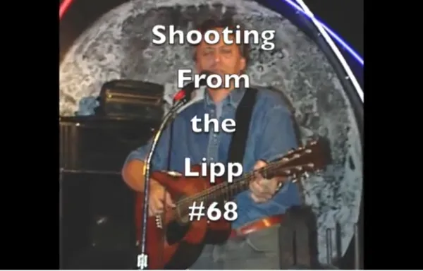 Dave Lippman playing guitar