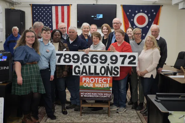 Protesters holding sign
