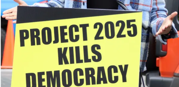 Sign saying Project 2025 kills democracy