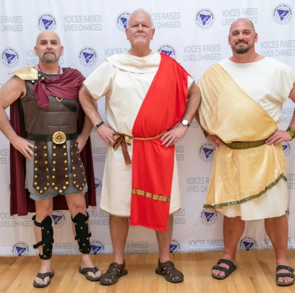 Singers posing in togas