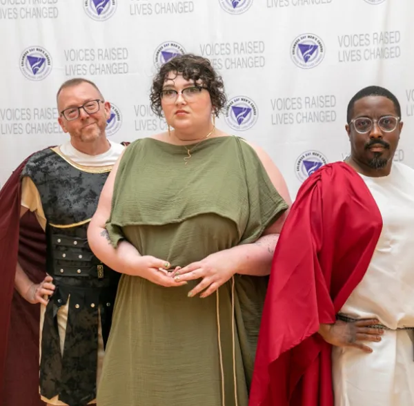 Singers posing in togas