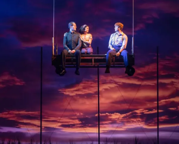 People on a high up swing