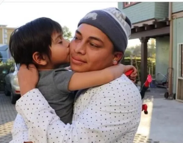 Woman holding child