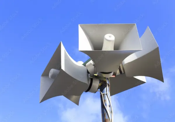 Speakers on a tall pole