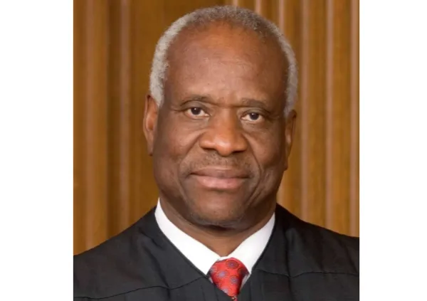 Black man in a Supreme Court robe