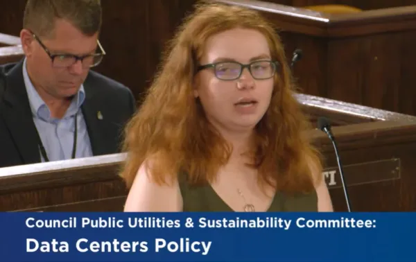 Woman speaking at podium