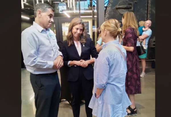 Amy talking with a constituent
