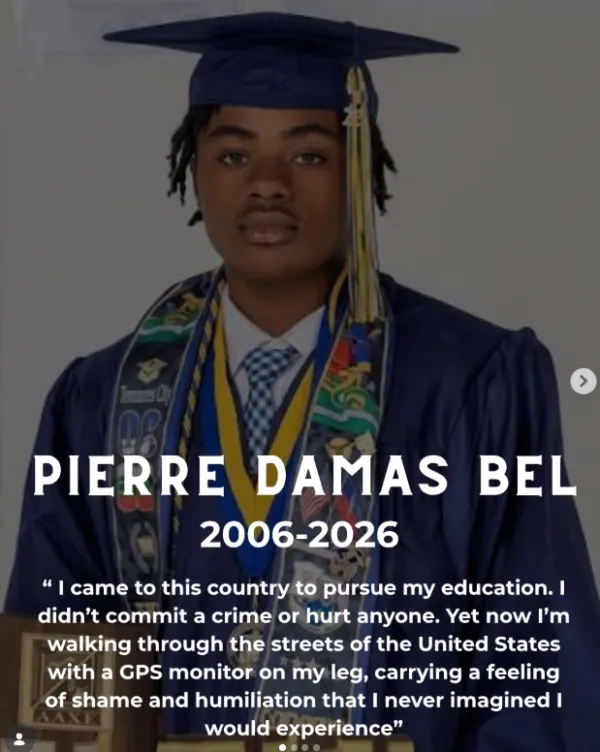 Young man with graduation robes on
