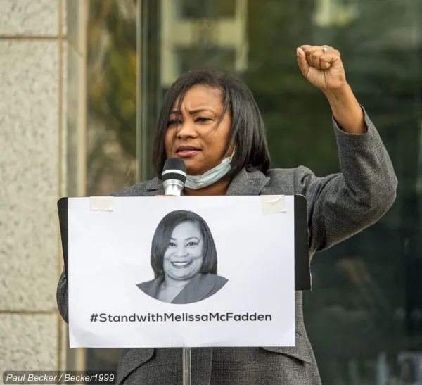 Lt. McFadden with her fist in the air