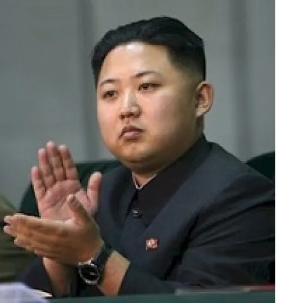 Young looking Asian man with no smile but clapping his hands