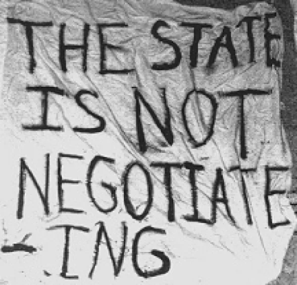 White banner with words The State is not negotiating