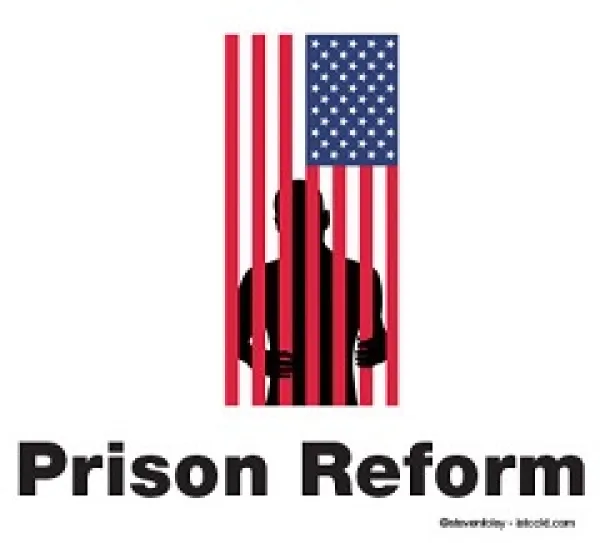 A flag hanging sideways and a silhouette of a man behind the red stripes as if they are bars and the words Prison Reform at the bottom