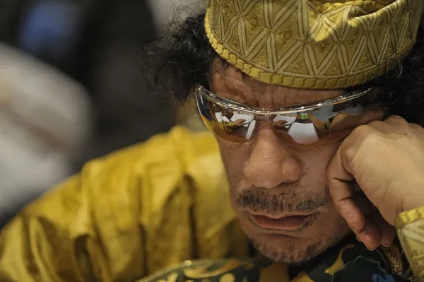 Close up of Qaddafi in sunglasses