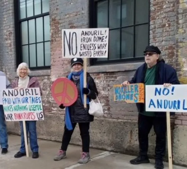 People holding signs