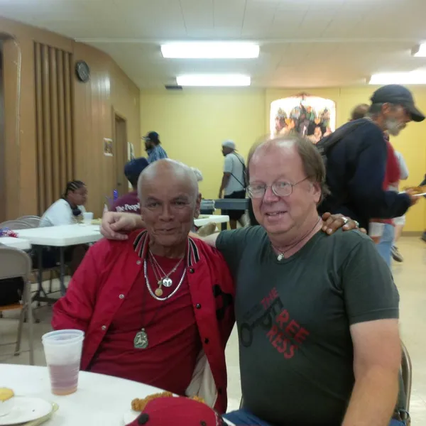 Two men sitting at a table 