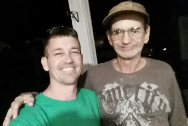 A young man and an older man