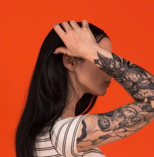 Girl with lots of tatoos