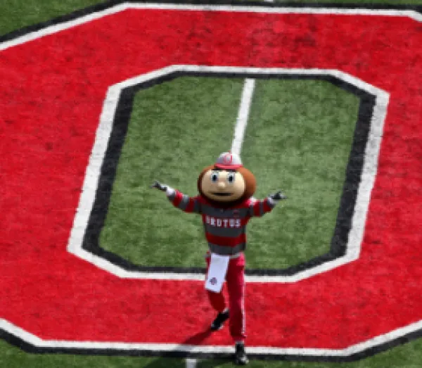 Brutus Buckeye on the football field