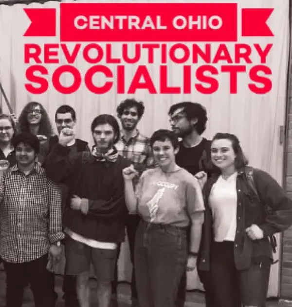 People posing with fists in air