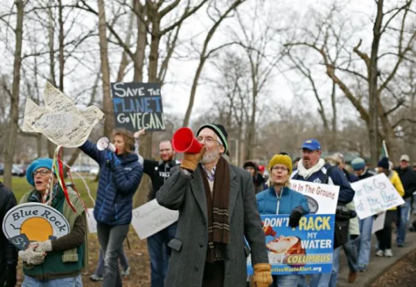 People marching for climate change in a park
