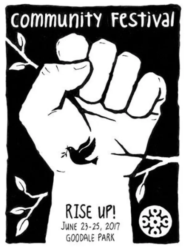 A fist with the words Community Festival