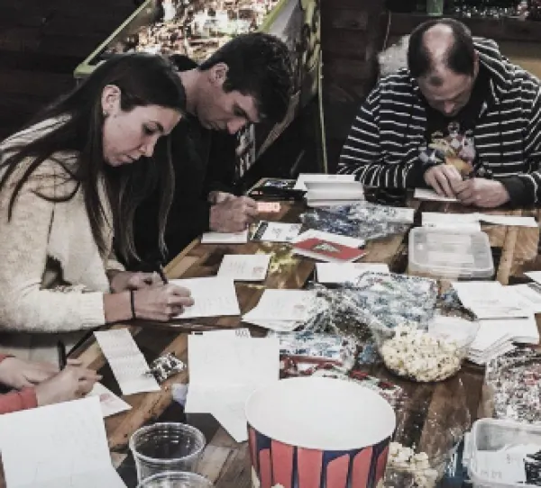 People writing letters