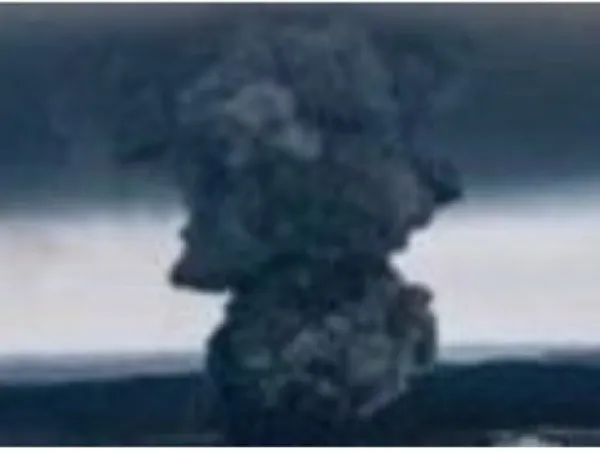 Smoke billowing in the air from explosion