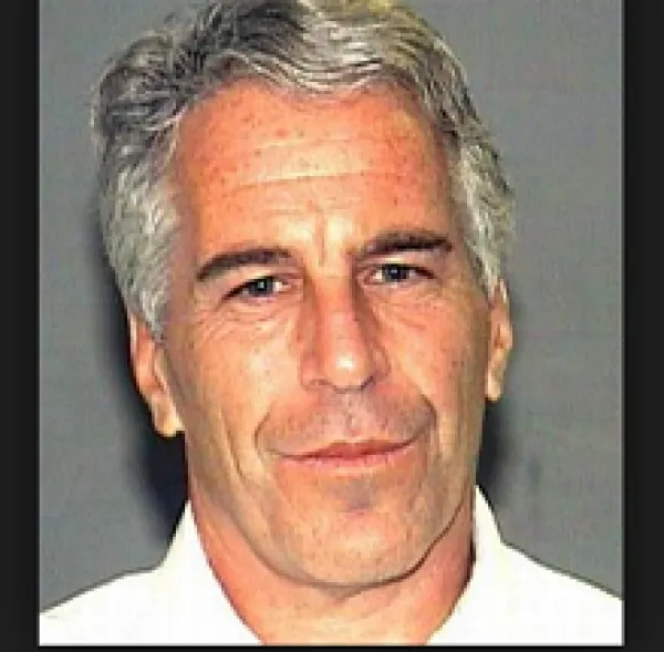 Gray haired white man with long face, black eyebrows looking worried