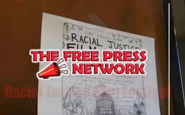 Newspaper saying Racial Justice and the words Free Press Network on top in red with a red bullhorn