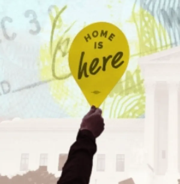 Sign saying Home is Here