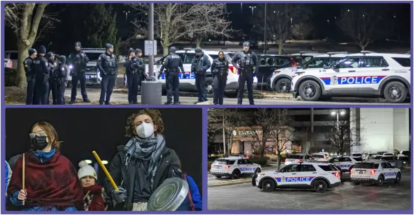 Police cars and officers at protest