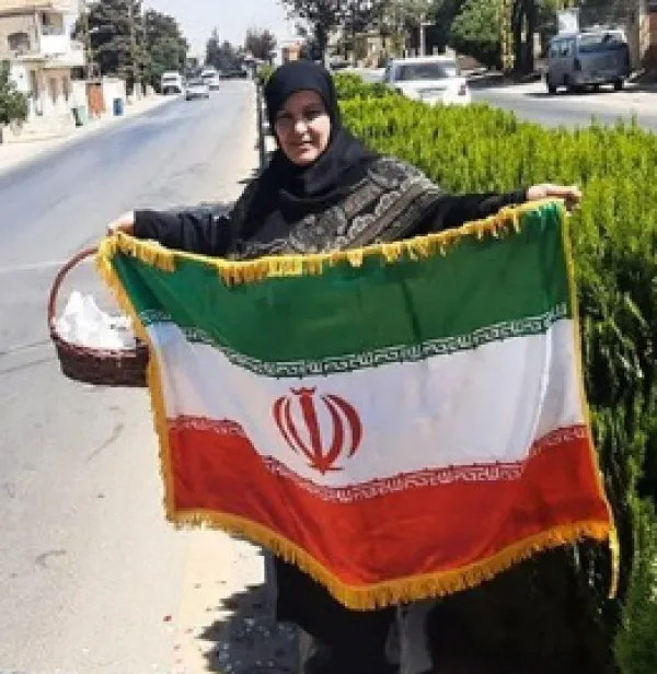 Woman holding Iranian flag