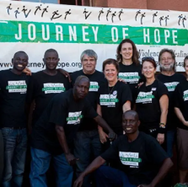 Journey of Hope people with banner