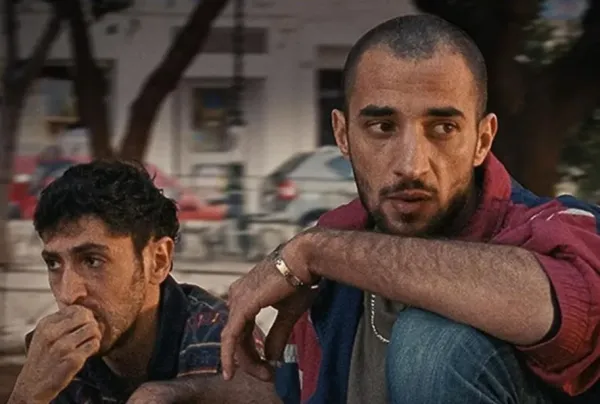 Two men sitting together