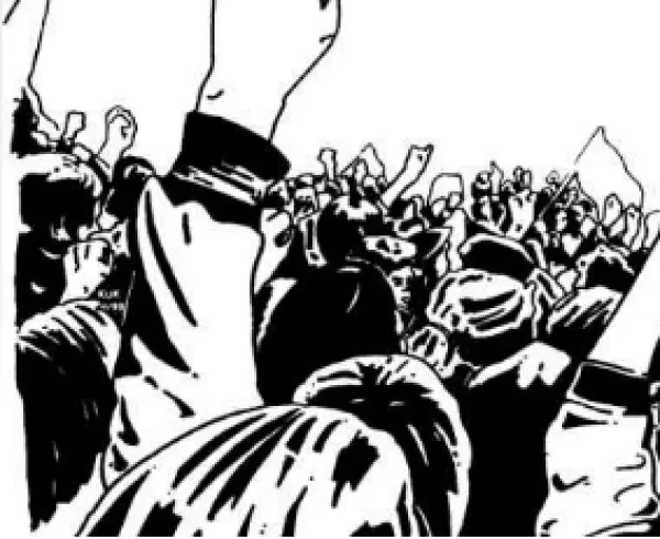 People with fists in air