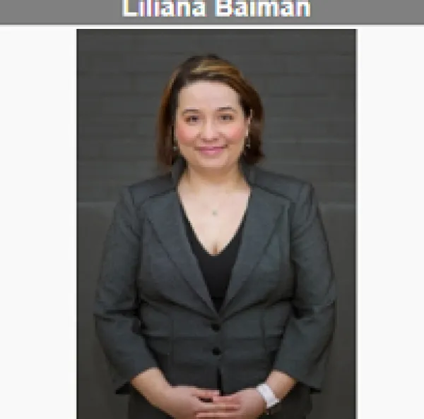 Young dark haired woman smiling