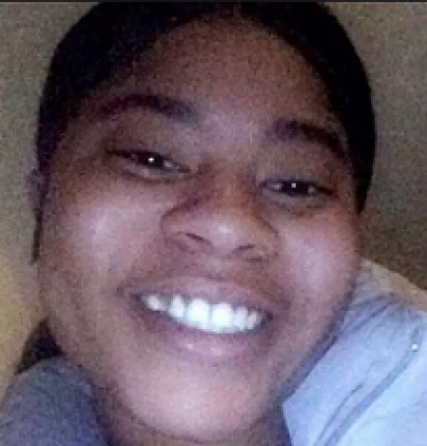 Close up of young black woman smiling