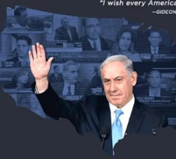 Gray haired white man in a suit waving in front of a silhouette of the United States with photos of news people talking