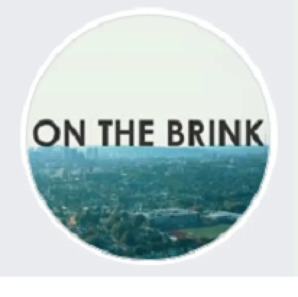 Words On the Brink above a city scene