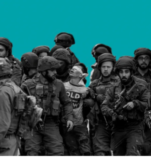 Kid in blindfold between lots of military men