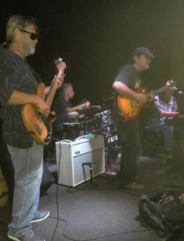 Guys playing instruments