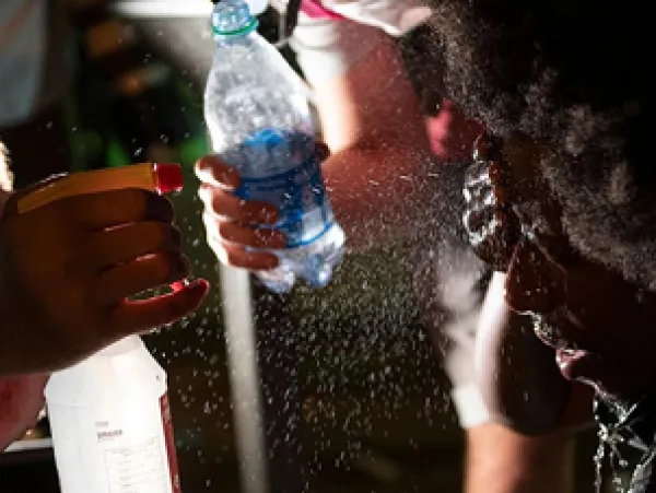 Giving water to protester
