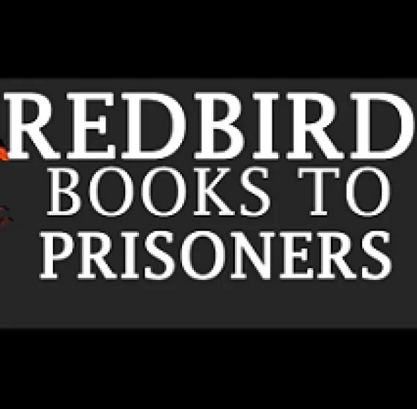 White letters on black background that says Redbird Books to Prisoners