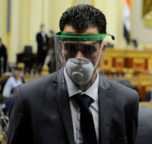 Man in mask and face shield