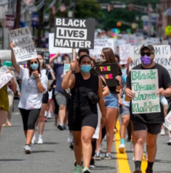 People marching with BLM signs