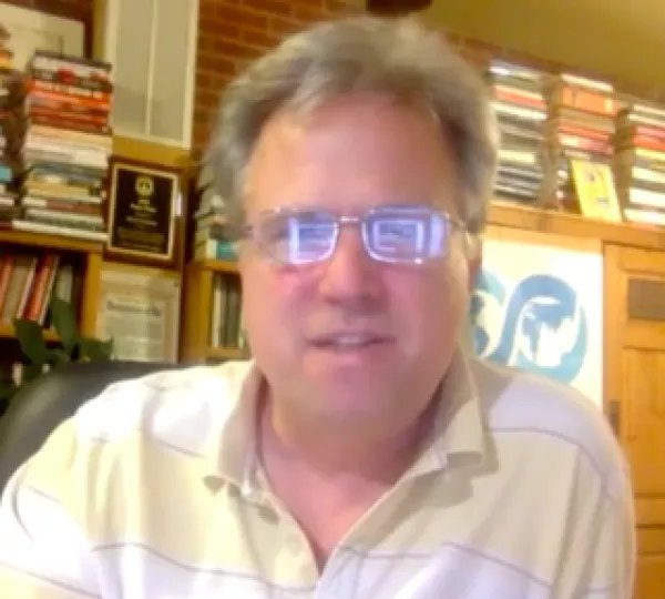 White man with glasses