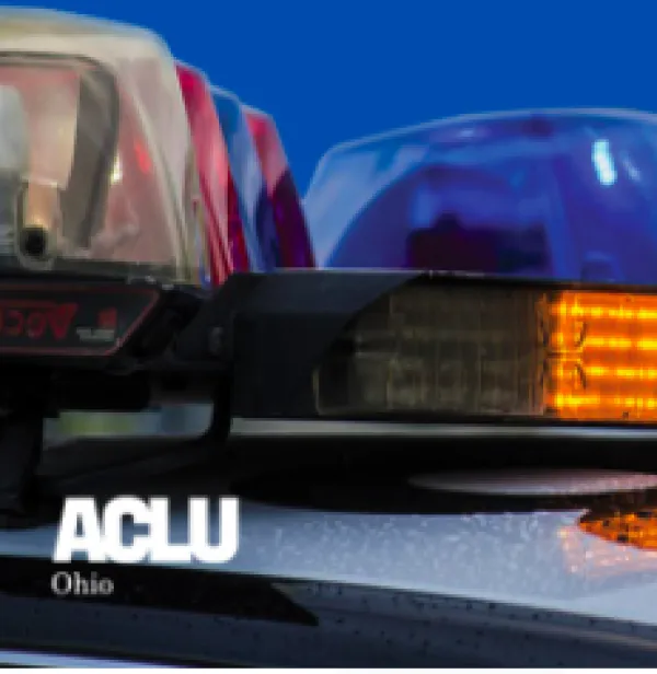 Words ACLU and lights on police car